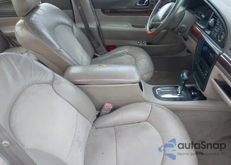 2002 Lincoln Continental z USA, uszkodzony, nr VIN 1LNHM97V52Y678644